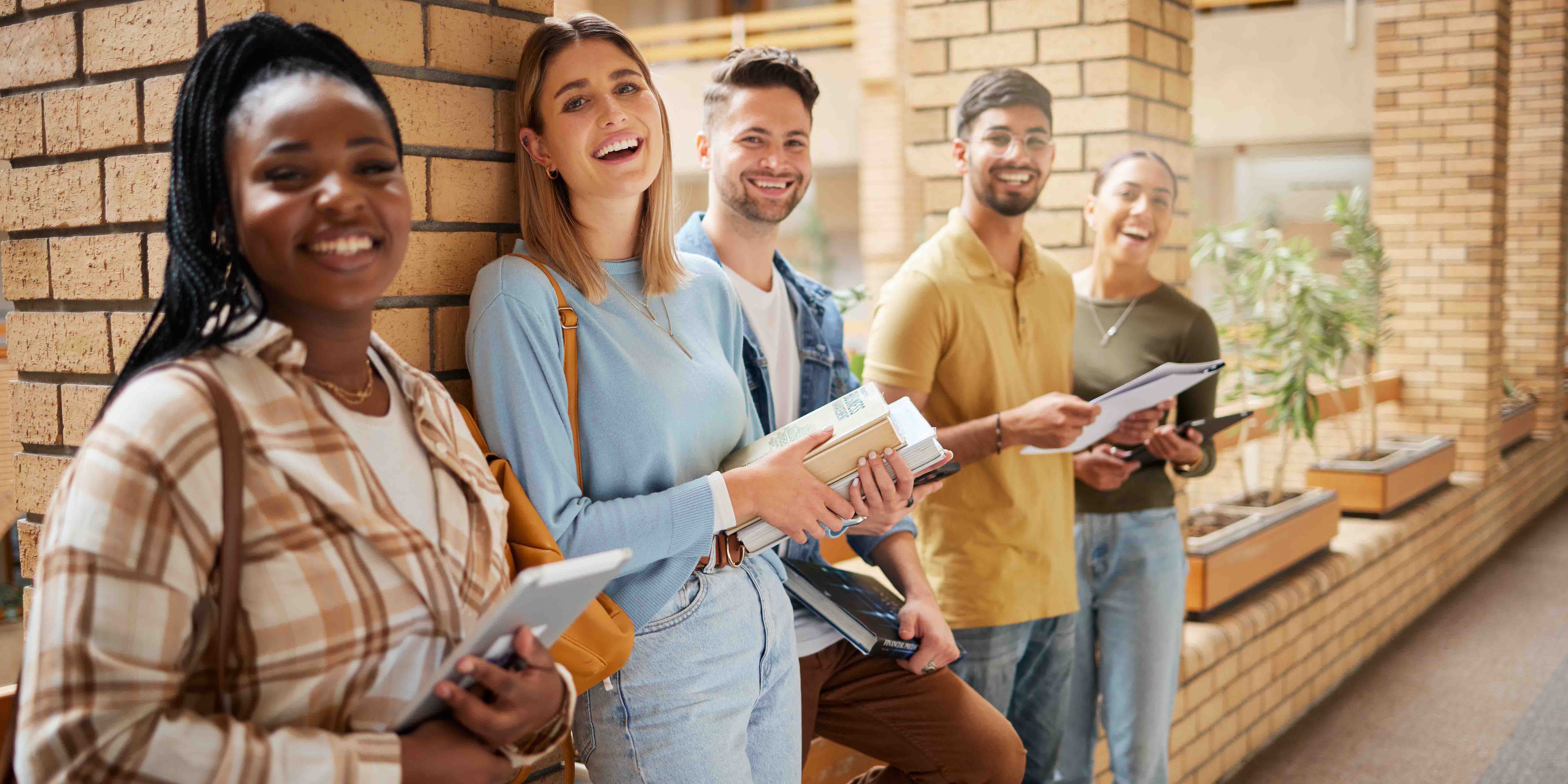 group of college students standing outside class