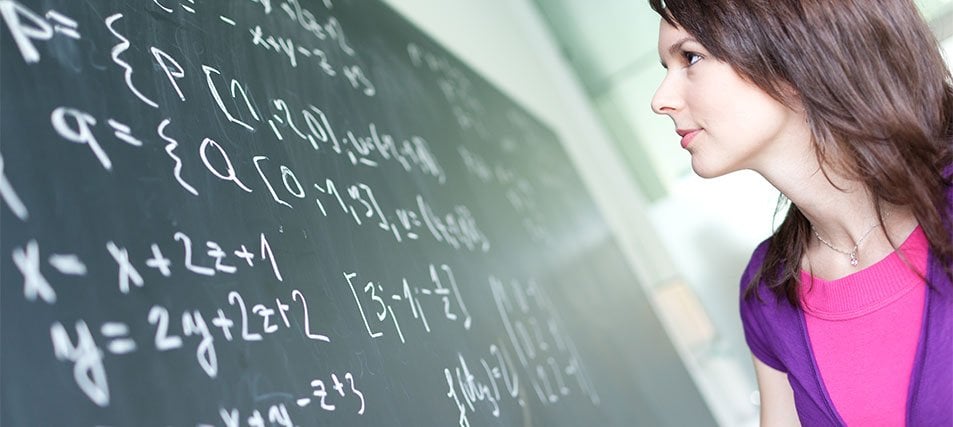 female student at chalkboard