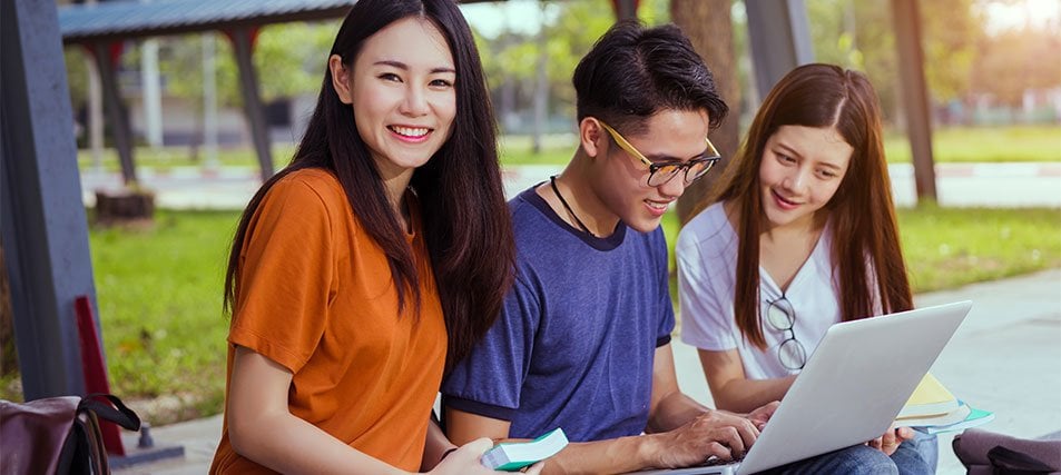 group of students on laptop